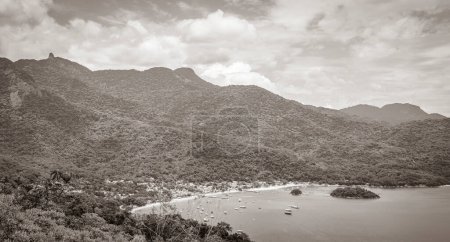 Photo for Old black and white picture of The big tropical island Ilha Grande Abraao beach panorama drone from above Angra dos Reis Rio de Janeiro Brazil. - Royalty Free Image
