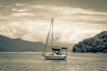 Photo for Old black and white picture of Boats ships and Boat trips from Abraao beach Ilha Grande Angra dos Reis Rio de Janeiro Brazil. - Royalty Free Image