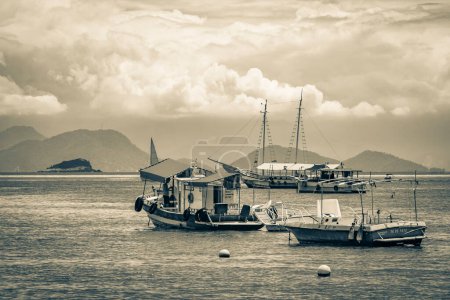 Photo for Ilha Grande 23. November 2020 Old black and white picture of Boats ships and Boat trips from Abraao beach Ilha Grande Angra dos Reis Rio de Janeiro Brazil. - Royalty Free Image