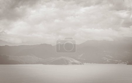 Photo for Old black and white picture of Panorama view from Abraaozinho on big tropical island Ilha Grande with drone from above to Portogalo Maciis Angra dos Reis Brazil - Royalty Free Image