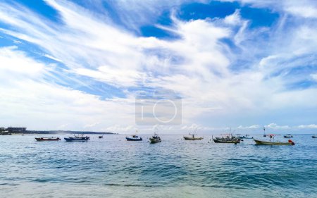 Photo for Fishing boats at the harbor and beach by Zicatela in Puerto Escondido Oaxaca Mexico. - Royalty Free Image
