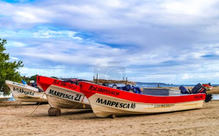 Photo for Fishing boats at the harbor and beach by Zicatela in Puerto Escondido Oaxaca Mexico. - Royalty Free Image