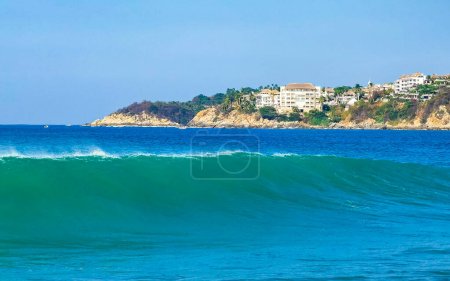 Photo for Extremely huge big surfer waves on the beach in Zicatela Puerto Escondido Oaxaca Mexico. - Royalty Free Image