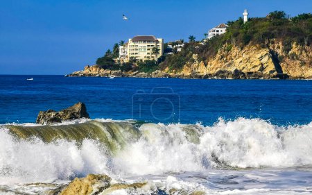 Photo for Extremely beautiful huge big surfer waves and rocks on the beach in Zicatela Puerto Escondido Oaxaca Mexico. - Royalty Free Image