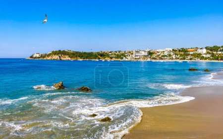 Photo for Extremely beautiful huge big surfer waves and rocks on the beach in Zicatela Puerto Escondido Oaxaca Mexico. - Royalty Free Image