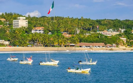 Photo for Puerto Escondido Oaxaca Mexico 04. October 2022 Fishing boats at the harbor and beach by Zicatela in Puerto Escondido Oaxaca Mexico. - Royalty Free Image