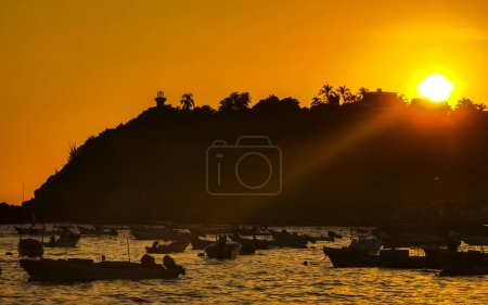 Photo for Beautiful stunning colorful and golden sunset in yellow orange red on beach and big wave panorama in tropical nature in Zicatela Puerto Escondido Oaxaca Mexico. - Royalty Free Image