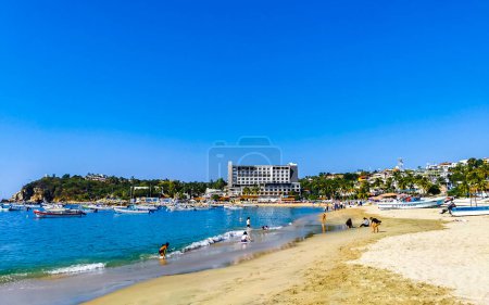 Photo for Sun beach people waves and boats in Zicatela Puerto Escondido Oaxaca Mexico. - Royalty Free Image