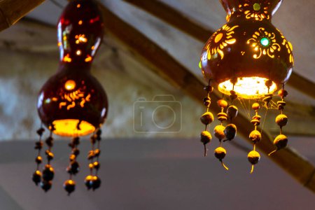 Foto de Beautiful decorative homemade lamps lights on Isla Holbox island in Quintana Roo Mexico. - Imagen libre de derechos