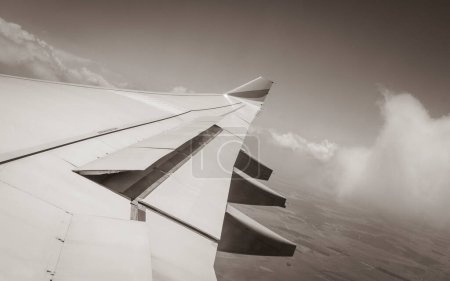 Photo for View from an airplane window at high altitude and turbines about Africa. - Royalty Free Image