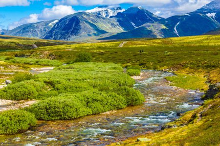 Beautiful mountain and landscape panorama with untouched nature rivers lakes and rocks stones in Rondane National Park Ringbu Innlandet Norway in Scandinavia.