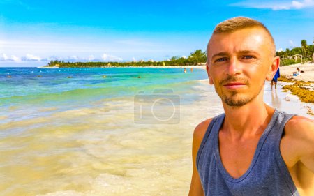 Photo for Male tourist and traveler at tropical caribbean mexican beach in Playa del Carmen Quintana Roo Mexico. - Royalty Free Image