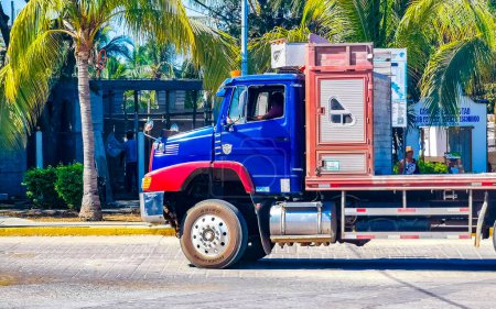 Photo for Puerto Escondido Oaxaca Mexico 28. March 2023 Blue and red old mexican truck transporter delivery car in Zicatela Puerto Escondido Oaxaca Mexico. - Royalty Free Image