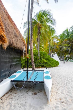 Hire canoes sailboats and pedal boats in Playa del Carmen Quintana Roo Caribbean Mexico.