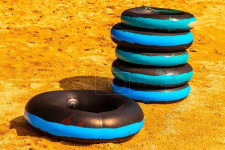 Inflatable floating tires on the beach in Pattaya Bang Lamung Amphoe Chon Buri Thailand in Southeastasia Asia.