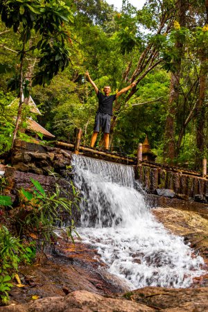 Beautiful waterfall on Doi Suthep Hiking Trail Wat Pha Lat in tropical jungle nature forest in Chiang Mai Amphoe Mueang Chiang Mai Thailand in Southeastasia Asia.