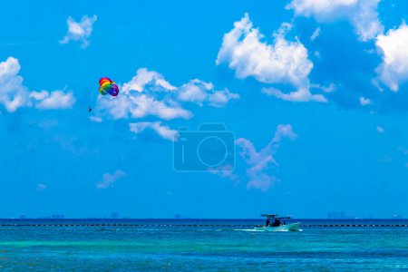 Photo for Paragliding with boat in the Caribbean in Playa del Carmen Quintana Roo Mexico. - Royalty Free Image