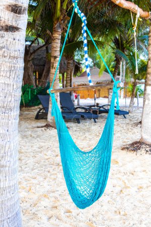 Photo for Hammock on a tropical paradisiacal beach in the Caribbean in Playa del Carmen Quintana Roo Mexico. - Royalty Free Image