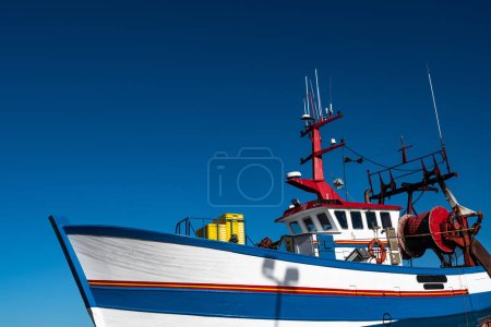 Photo for Fishing Boat In The Harbor Docks Of Finistere City Guilvinec At The Coast Of Atlantic In Brittany, France - Royalty Free Image