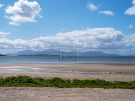 View over Inchmarnock Island to the Isle of Arran from Ettrick Bay on the Isle of Bute, Scotland
