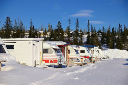 Photo for Snowy Winter camping with trailer - Royalty Free Image