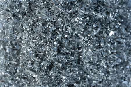 Closeup torsadé acier spirale ou copeaux de métal d'aluminium et de coupe, concept de recyclage des matériaux industriels.