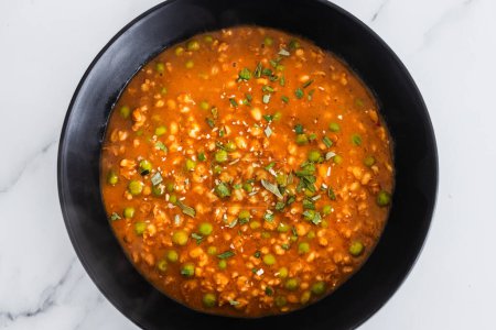 plant-based barley and peas curry with tikka masala sauce, healthy vegan food recipes