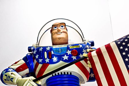 Photo for Osaka,Japan - Apr 11, 2023 : Display of American Color Buzz Lightyear with USA Stars and Stripes Flag. - Royalty Free Image