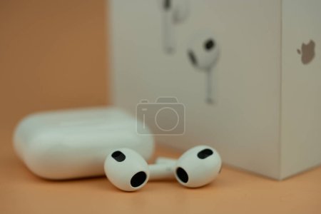 Photo for Bangkok, Thailand - December 10, 2022 : AirPods 3 generations. Headphones from the apple company close-up - Royalty Free Image