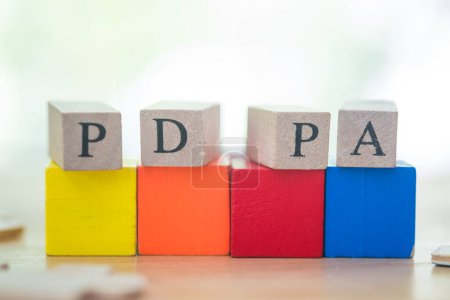 Téléchargez les photos : Personal Data Protection Act or PDPA concept. Wood block with text PDPA on colorful wood block - en image libre de droit