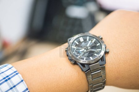 Photo for Bangkok, Thailand - April 13, 2023 : Luxury Watch Casio edifice watch brand a model of a ECB-2000DC-1A on man hand, Close up - Royalty Free Image