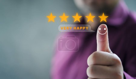 Hand with thumb up positive emotion smiley face icon and 5 star with copy space. Emotional smiley faces showing excellent satisfaction. rating very impressed. Customer service and satisfaction concept
