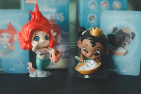 Photo for Bangkok, Thailand - November 11, 2023: POP MART Disney 100th anniversary Princess Childhood Series Figures, Ariel and Tiana - Royalty Free Image