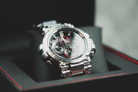 Photo for Bangkok, Thailand - February 3, 2024 : G-SHOCK watch model MTG-B1000D-1ADR model, an elegance and luxurious watch, stands out with a metallic red color. - Royalty Free Image