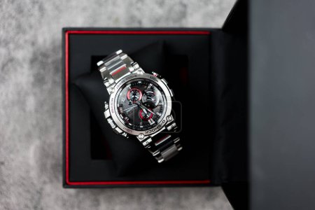 Photo for Samut Prakan, Thailand - February 8, 2024 : Open box of Casio G-Shock model MTG-B1000D-1ADR, stainless steel wristwatch. G-Shock is a line of watches manufactured by Casio. - Royalty Free Image