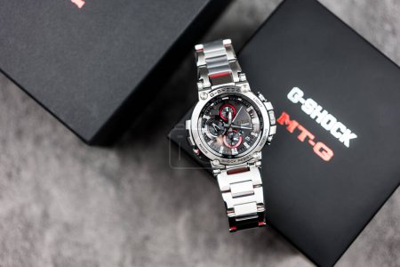 Photo for Bangkok, Thailand - February 9, 2024 : G-SHOCK watch model MTG-B1000D-1ADR model, an elegance and luxurious watch, stands out with a metallic red color. - Royalty Free Image