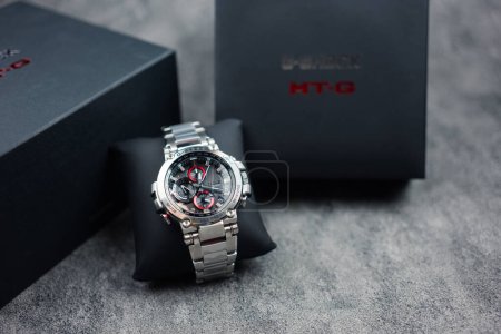 Photo for Bangkok, Thailand - February 12, 2024 : G-SHOCK watch model MTG-B1000D-1ADR model, an elegance and luxurious watch, stands out with a metallic red color. - Royalty Free Image