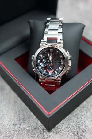 Photo for Bangkok, Thailand - February 14, 2024 : Open box of Casio G-Shock model MTG-B1000D-1ADR, stainless steel wristwatch. G-Shock is a line of watches manufactured by Casio. - Royalty Free Image