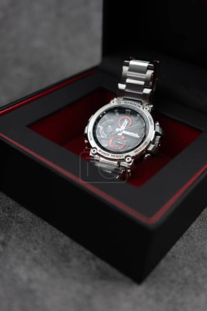 Photo for Bangkok, Thailand - February 21, 2024 : G-SHOCK watch model MTG-B1000D-1ADR model, an elegance and luxurious watch, stands out with a metallic red color. - Royalty Free Image