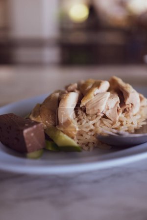 Steamed rice topped with chicken, Thai called Khao Mun Gai