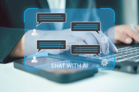 Téléchargez les photos : Chatbot chat AI concept. Homme d'affaires utilisant la technologie de robot intelligent AI bavarder avec chat bot, bavarder avec l'IA ou la technologie d'intelligence artificielle. - en image libre de droit