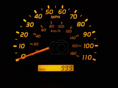 Glowing speedometer - orange and yellow numbers