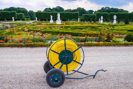 Chariot portatif de moulinet de brouette de tuyau d'arrosage de jardin pour les pelouses d'herbe de jardin, les parterres de fleurs et l'arrosage d'arbres