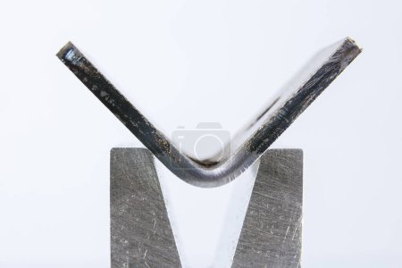 Photo for Sheet metal bending tool and equipment isolated on a white background. Special Bending machine Forming mold punch and die. Press brake tools, bend tools, press brake punch and die. - Royalty Free Image