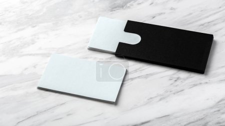Photo for Business card mockup with black paper card holder on white marble background - Royalty Free Image
