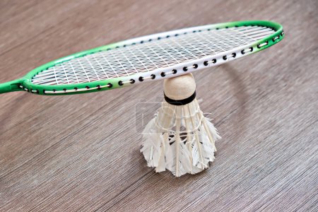 Photo for There is a badminton racket on the steering wheel. Professional sports equipment. - Royalty Free Image