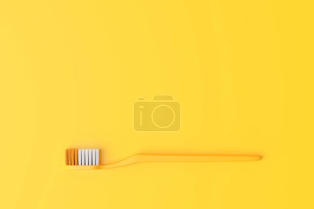 Foto de Cepillo de dientes de plástico de primer plano sobre el fondo amarillo con espacio para copiar. Ilustración de representación 3d - Imagen libre de derechos