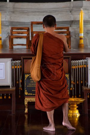 Photo for Thai monks people journey visit archaeology and pay respect praying ancient antique buddha statue at Wat Phu Khao Thong or Phukhao Thong temple on November 6, 2022 in Phra Nakhon Si Ayutthaya Thailand - Royalty Free Image