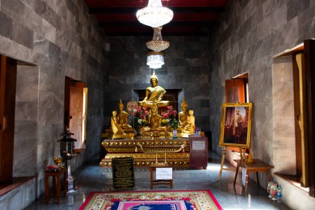 Photo for Ancient buddha statue in antique ubosot ordination hall for thai people travel visit respect praying blessing wish mystery in Wat Prodket or Prod ket temple on January 29, 2023 in Nonthaburi, Thailand - Royalty Free Image