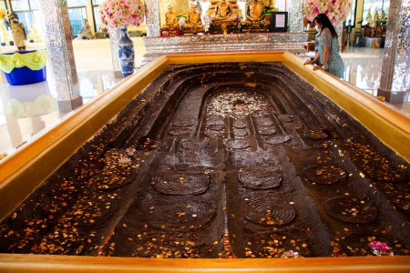 Photo for Ancient footprint of Lord Buddha in antique ubosot of Wat Prod ket temple for thai people travel visit and respect praying blessing wish mystery holy worship on January 29, 2023 in Nonthaburi Thailand - Royalty Free Image